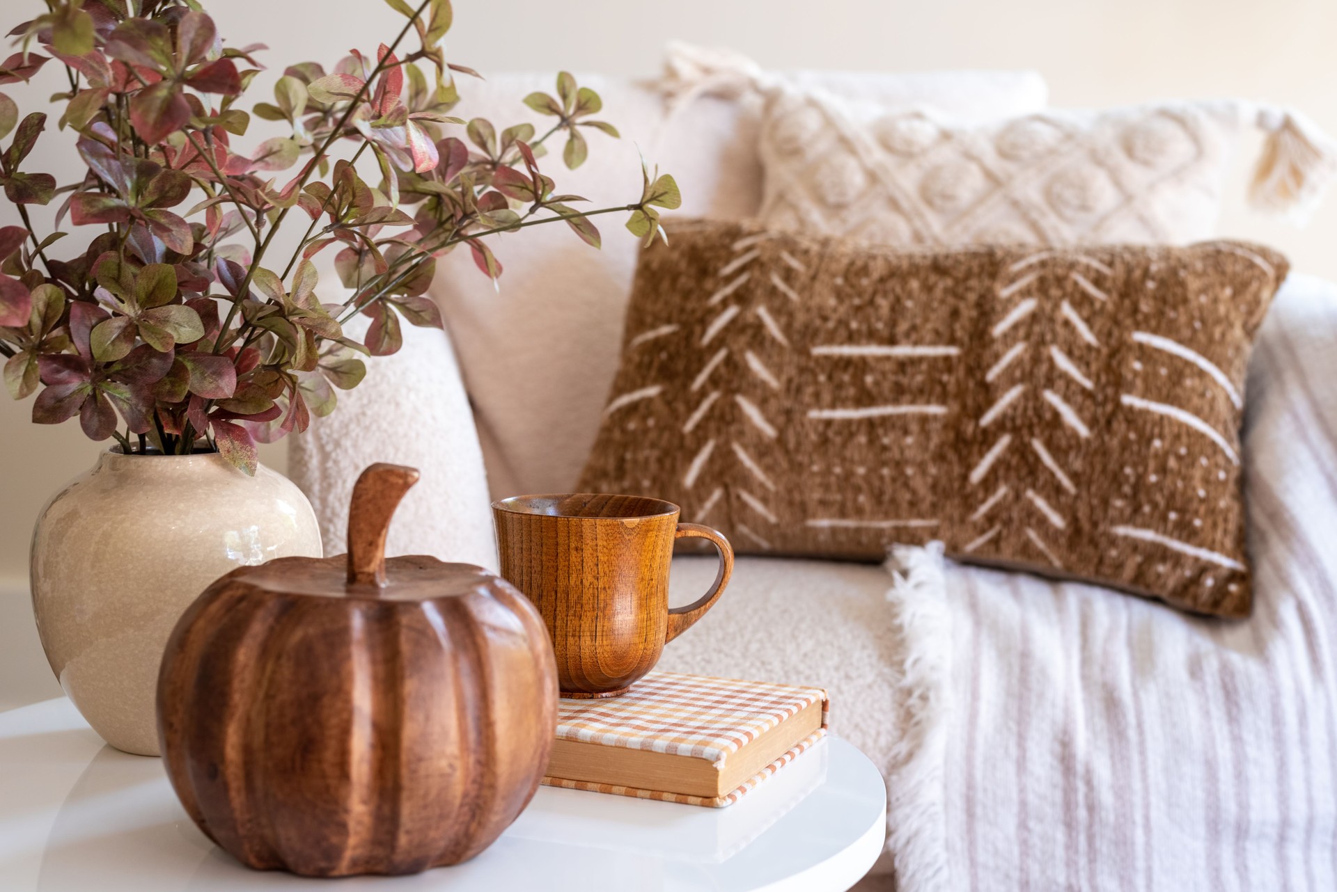 Fall decor still life with coffee mug and a book